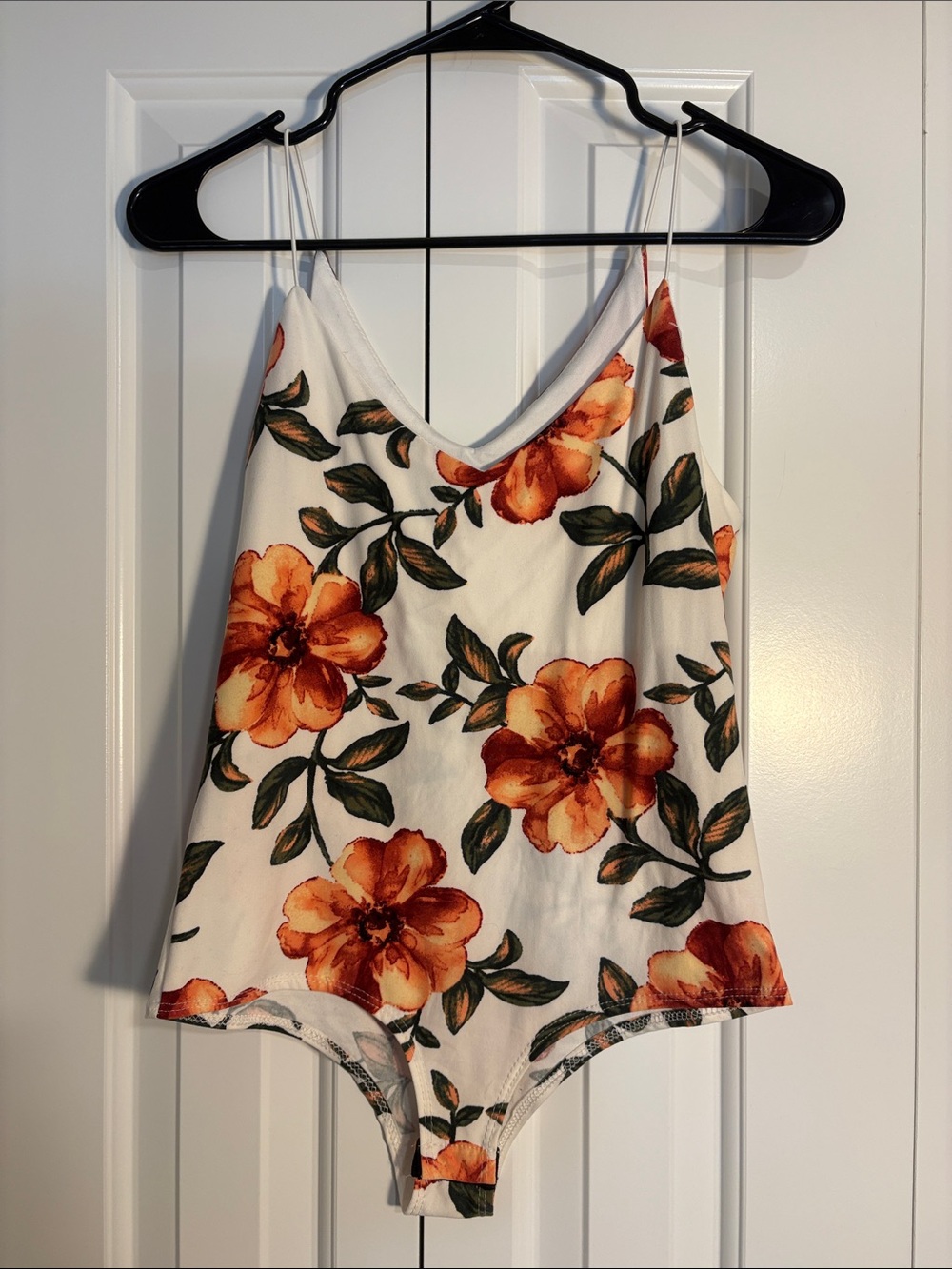 Discreet White Cami Bodysuit with Orange Floral Print